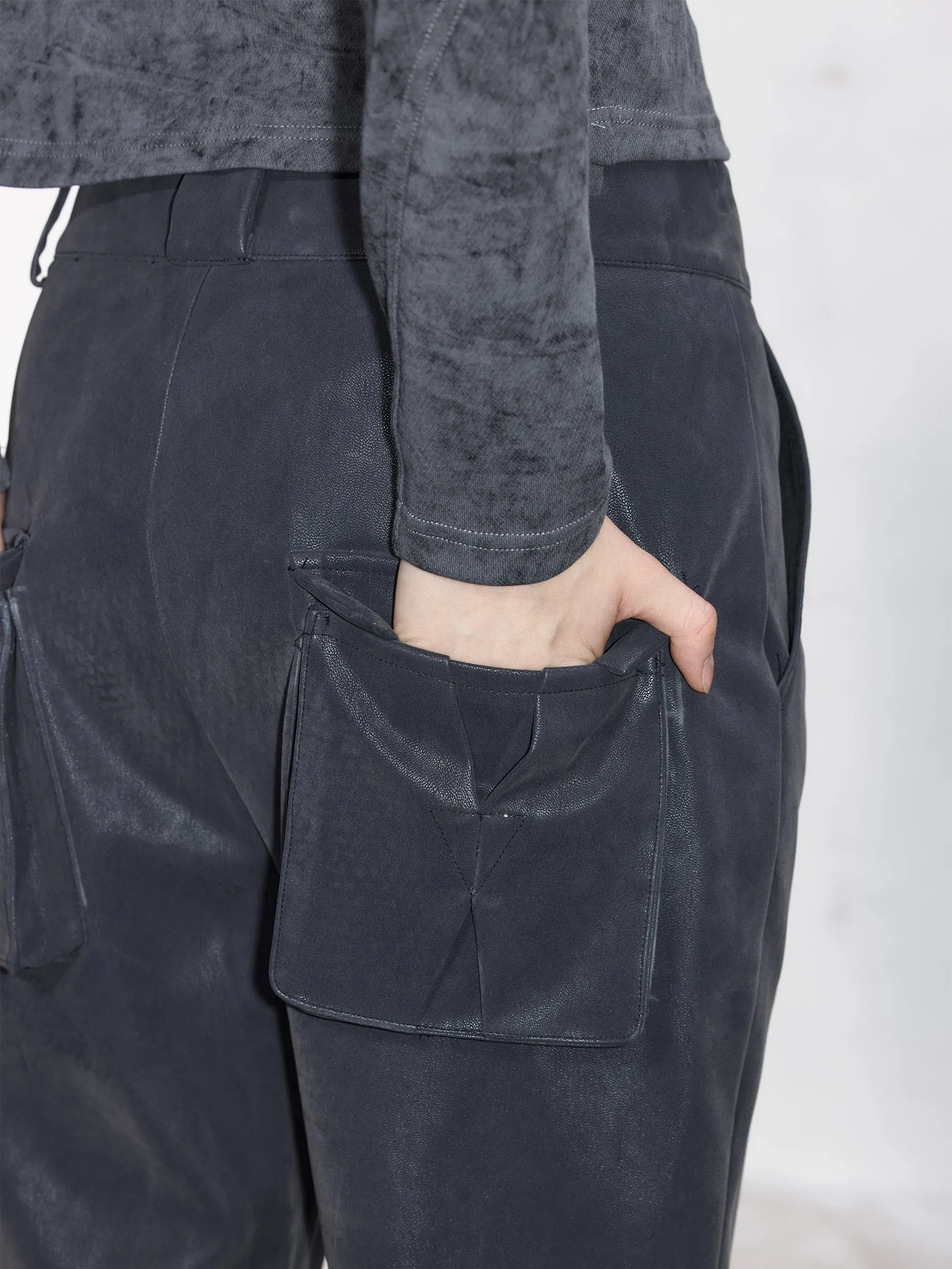 Embossed 3D pockets Flared leather pants