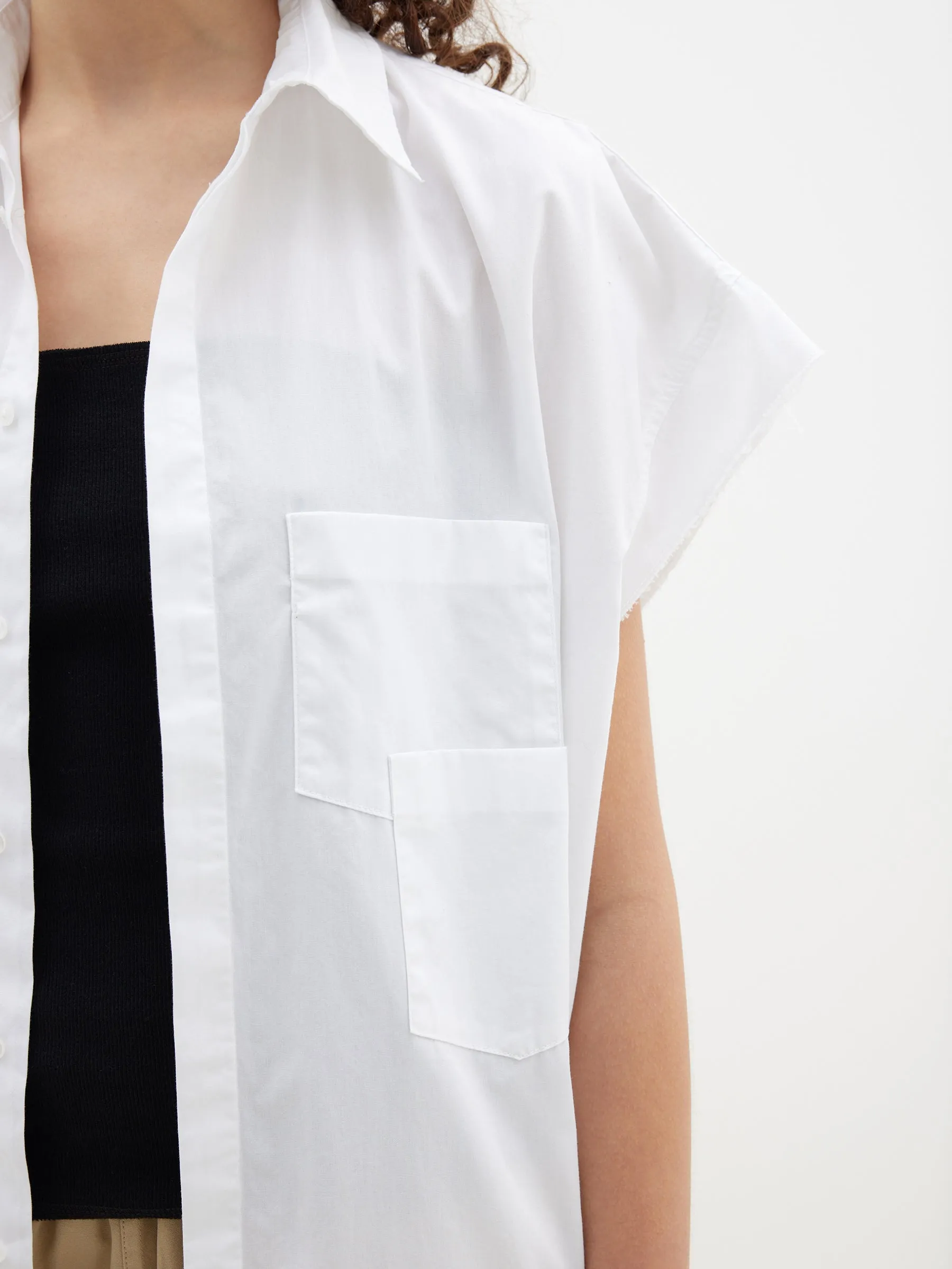 raw sleeveless shirt