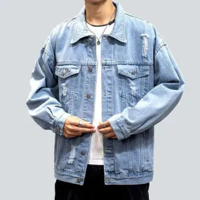 Ripped oversized men's denim jacket